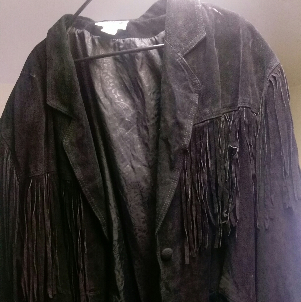 Jacket with tassels